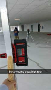 Surveying concrete slab elevations with laser level