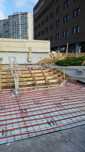 Field review of formwork and glycol heating system prior to concrete pour